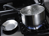 Bubbles rising in a pot of water on the stove