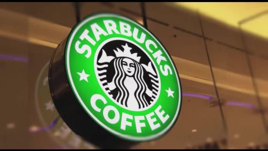 Image showing consumer drinking Starbucks coffee 